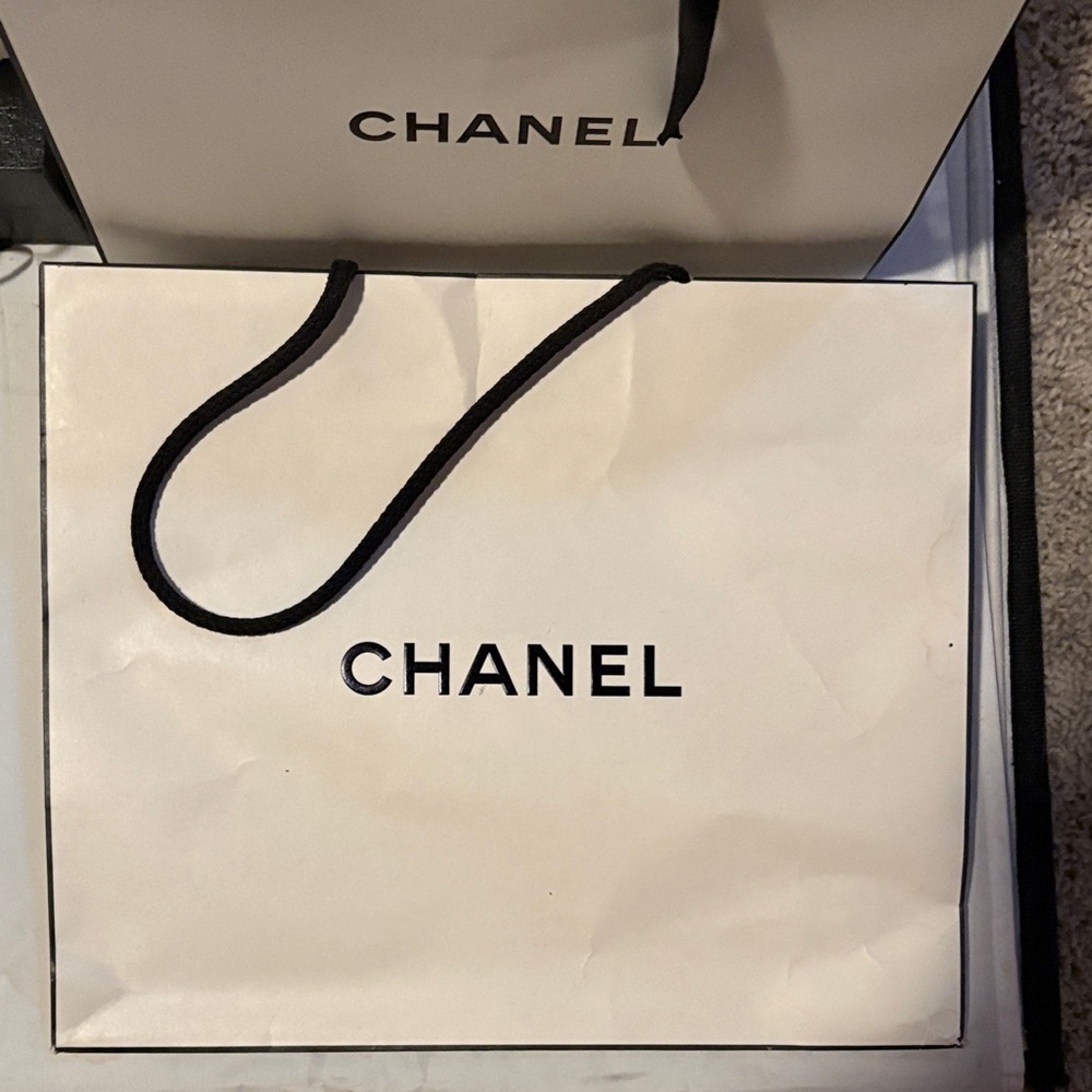 CHANEL Cream Shopping Bag with Black Handles slightly creased